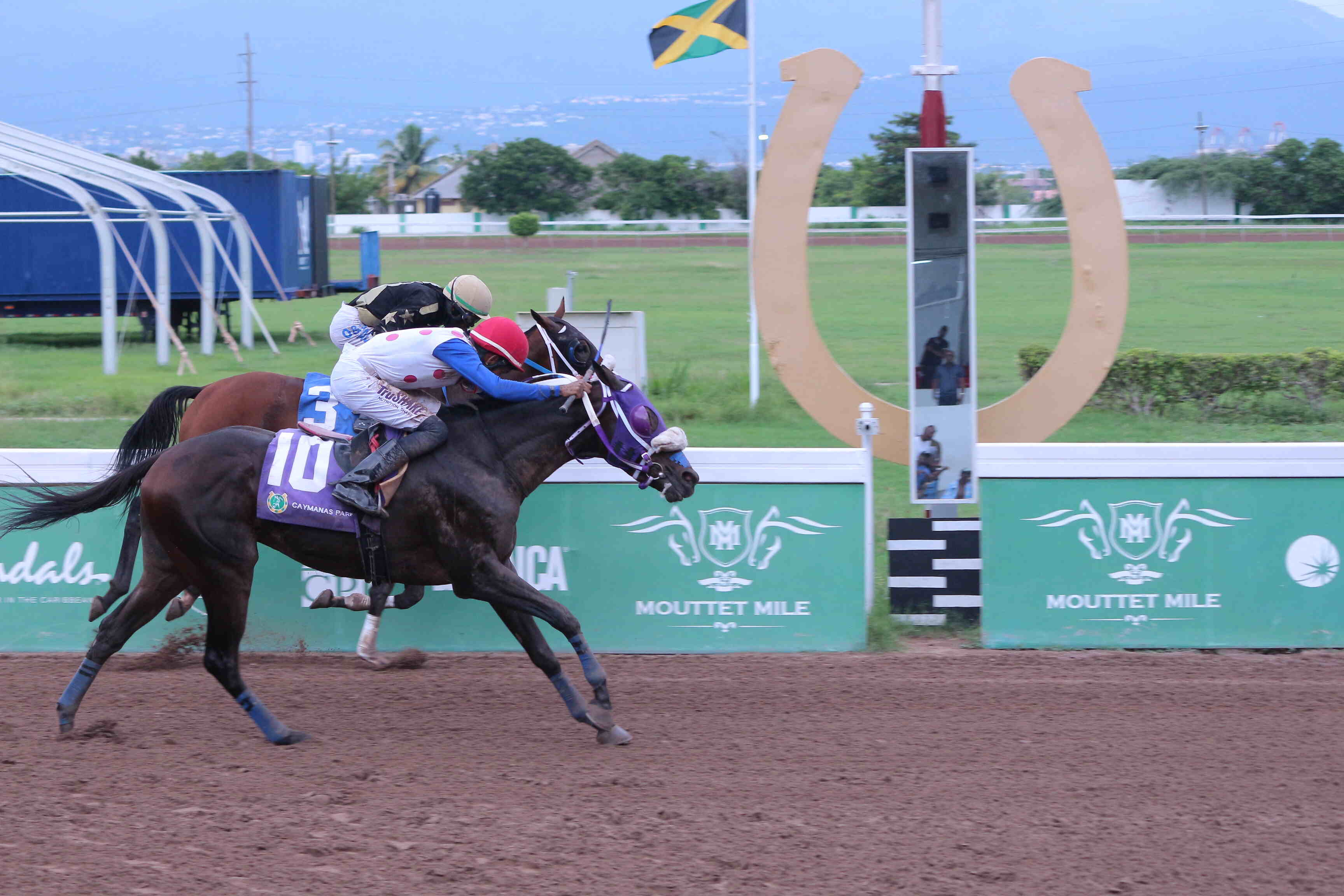 Jockey Raddesh Roman secures a triumphant victory in a fiercely contested race to claim The Reprieve Trophy on Saturday at Caymanas Park Champions Crowned and Palates Delighted at Caymanas Park’s Boots, Barrel, and Bourbon Event
