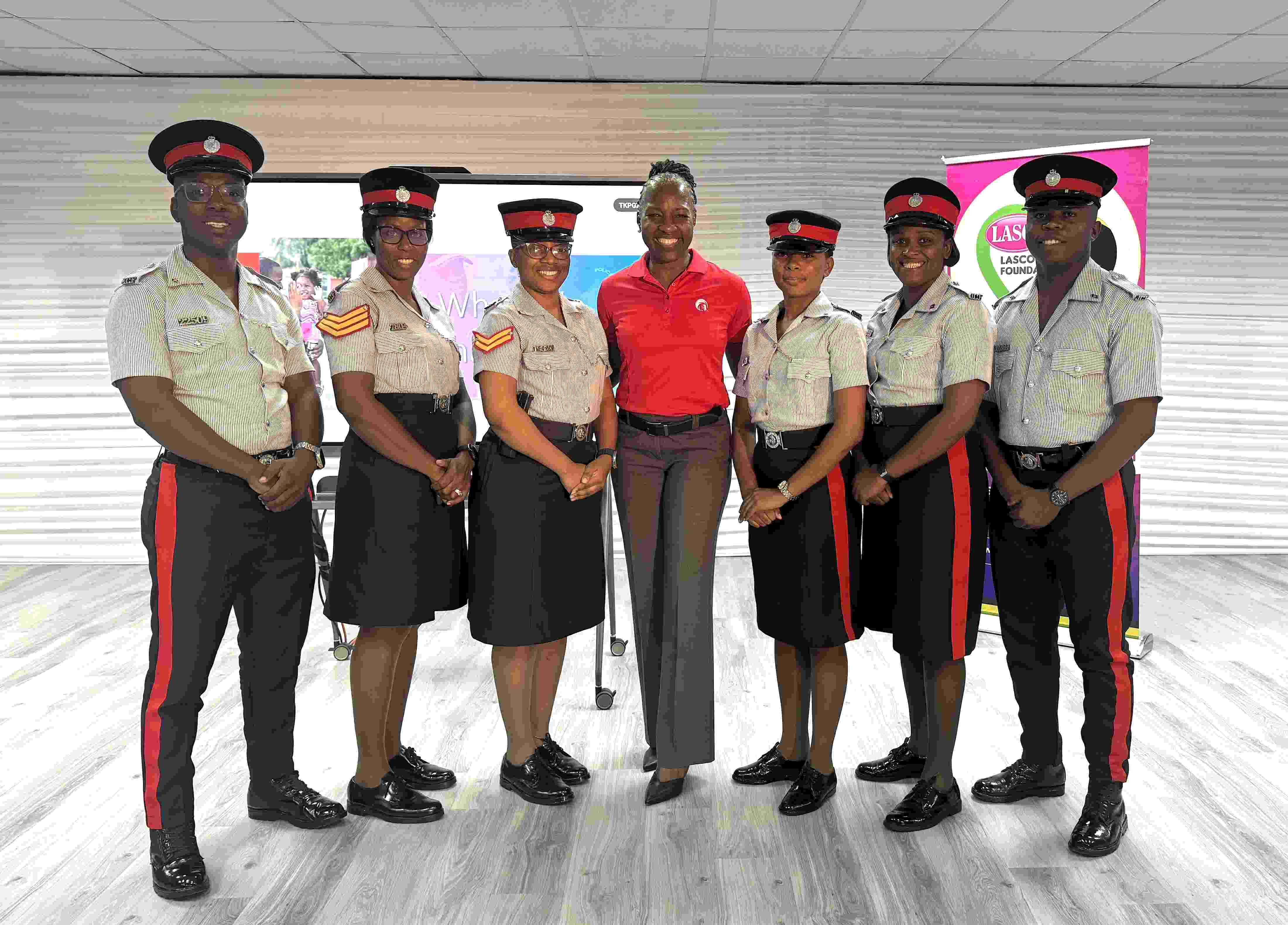 (From left) Constable Junior Thompson – Area 5 Headquarters, Sergeant Margaret Simms-Williams – Area 3 Headquarters, Corporal Namoy Roberts – Area 2 Police Headquarters, Veteran Broadcaster Paula-Anne Porter Jones, who led the effective communications skills workshop, Constable Moesha Allen – Area 4 St. Andrew South Community Safety and Security Unit, Corporal Shantel Watson – Area 1 Community Safety and Security Branch (CSS), and Constable Jahvarn Brown – CSSB HQ Domestic Violence Intervention Unit (Non-Geographical), proudly pose after a productive day of learning. LASCO/JCF Top Six Finalists Selected for Saluting Our Heroes