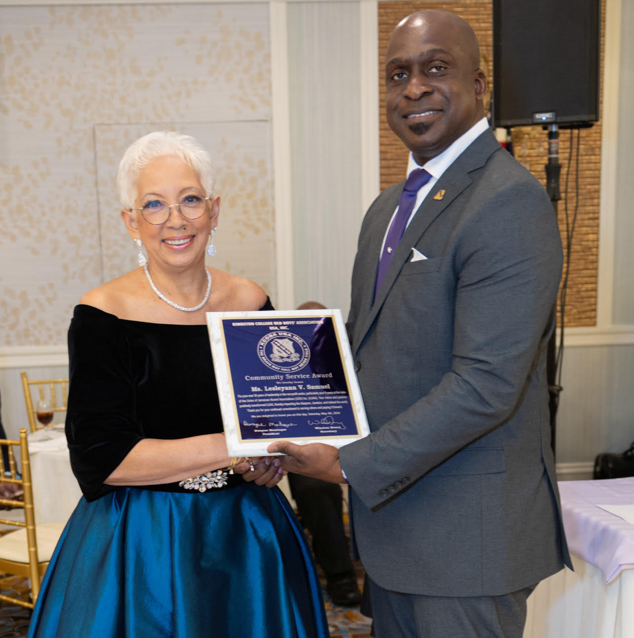 Lesleyann Samuel accepts her award from Rainford "Perry" Bloomfield, Immediate Past President of the KC Old Boys Association New York Chapter. JAMAICAN BORN ENGINEER LESLEYANN SAMUEL CELEBRATES A LIFE OF COMMUNITY SERVICE WITH LATEST AWARD