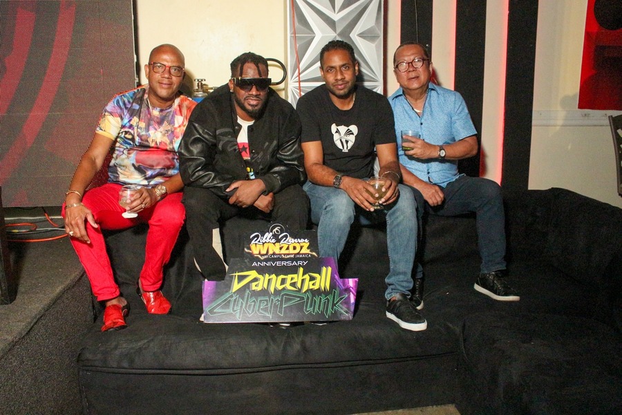 The Ribbiz Lounge Co-Directors Don Creary (l), Kamal Bankay and Brian 'Ribbie' Chung take a moment from celebrating to grace the lens with Sandre Malcolm CEO Campus Elite and Promoter of Ribbiz Reserve WNZDZ on Wednesday at Ribbiz UltraLounge Ribbiz Reserve WNZDZ Celebrates One Year Milestone