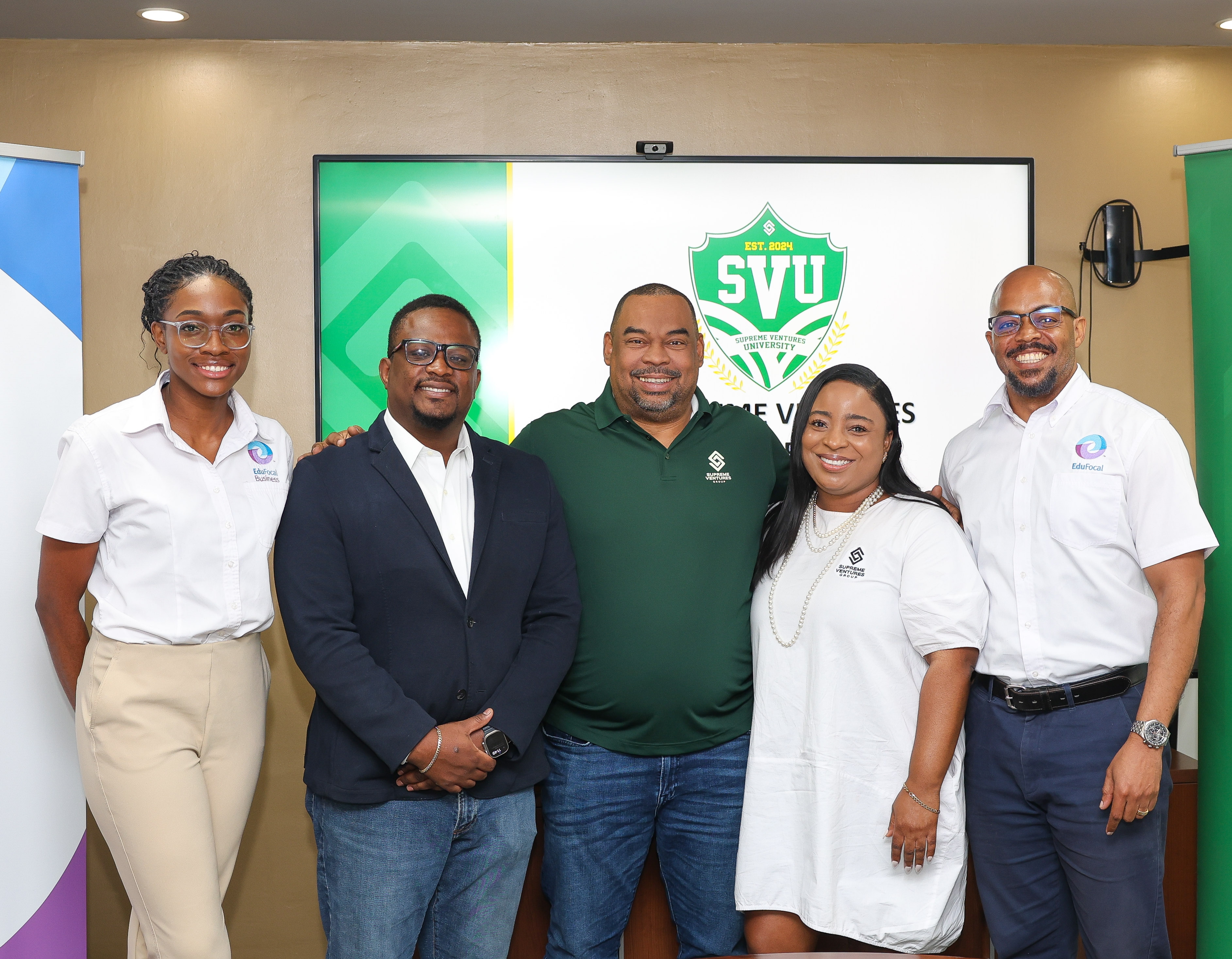 “Gary Peart, SVL Executive Chairman (centre) and Sasha-Kay Burke, SVL Head of HR and Admin (2nd right) pose with EduFocal team members (L-R) Regina Taylor, General Manager – EduFocal Business, Gordon Swaby, CEO and Mark Green, Chief Operating Officer at the recent launch of Supreme Ventures University.”