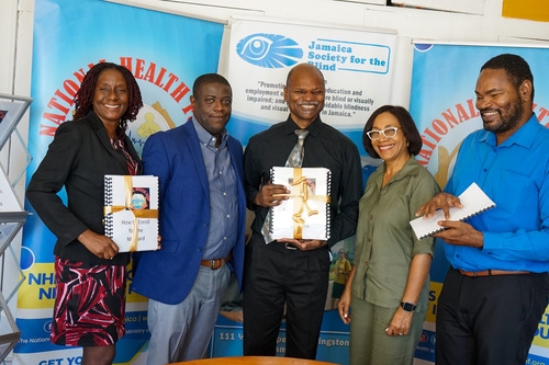 NHF’s CEO, Everton Anderson [second left] and Director of Health Promotion, Public Relations and Customer Care, Shermaine Robotham [second right] share a photo with Vice Principal of the Salvation Army School for the Blind, Sherine Whyte [left], Daemion McLean, JSB chairman [right] and Conrad Harris, JSB president [center] after presenting the booklets during the ceremony on Thursday, April 25, 2024.